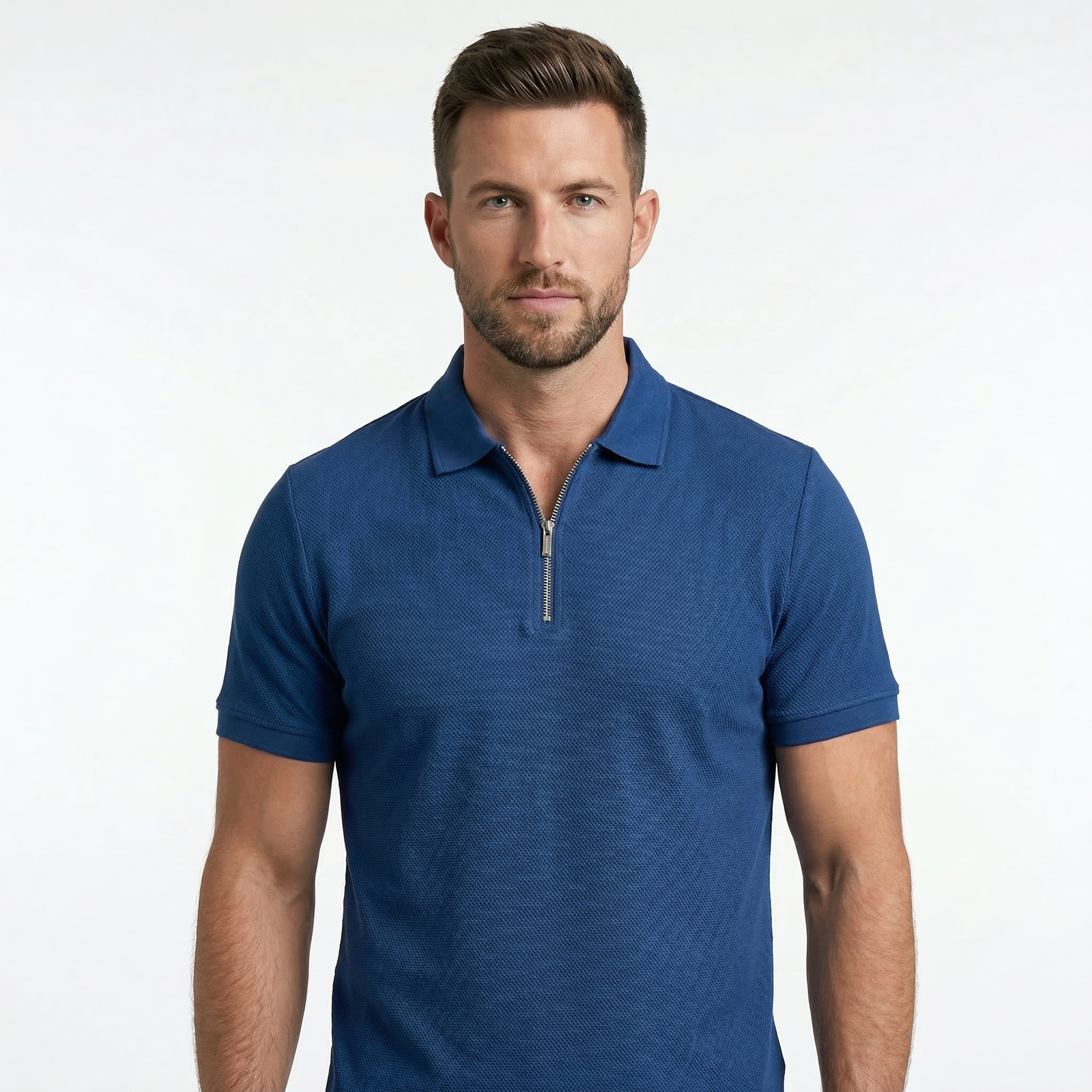 Mens Textured Zip Polo A model wearing a green textured knit zip polo shirt with a flat knit collar and short sleeves
